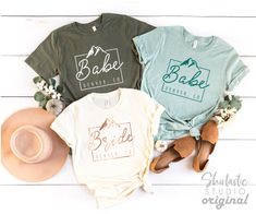 three t - shirts with the words bride and bridal on them next to hats