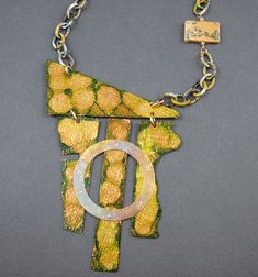 One of a kind OOAK  handmade jewelry created by Mary Heuer in her Wisconsin studio. Textured copper has an alcohol ink patina in yellow/green tones witih a brass round washer riveted on the front.  This showstopper is finished off with a lime patina copper chain and an agate rectangle.  It simply slips on over your head and you're ready to go.  Striking All of my one of a kind necklaces and bracelets are shipped USPS Priority Mail within 1-5 days after receipt of payment.  Measurements are appro Unique Green Patina Necklaces, Green Artisan Necklace With Patina, Artisan Green Necklace With Patina, Unique Hand-painted Copper Jewelry, Unique Hand Painted Copper Jewelry, Gold Patina Pendant Jewelry, Artsy Gold Pendant Jewelry, Artsy Green Patina Jewelry, Gold Pendant Jewelry With Patina