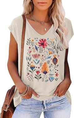 PRICES MAY VARY. Women's Lotus Floral Tank Tops Casual Summer Sleeveless Wildflowers Floral Graphic Tees Tops Design:Women's Vintage Flowers Shirt Casual Boho Cottagecore Pastel Botanical Floral Printed T-Shirt Wildflowers Graphic Tees. Unique and cute design, daisy, dandelion, sunflowe, wildflower decorations, cute aesthetic tops. Short sleeves, cool and fashionable. Flower shirts for women is simple but energetic, show your charm. Occasion: This flower top is very suitable for any occasion, es Boho Shirts For Women, Cute Aesthetic Tops, Wildflower Decorations, Cottagecore Pastel, Aesthetic Tops, Pastel Botanical, Over 40 Outfits, Boho Cottagecore, Summer Cap