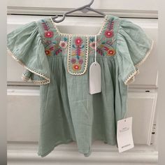 Nwt 3yr Louise Misha Yosana Blouse In Green Water 100% Cotton Similar To: Apolina Misha Puff Soor Ploom Rylee Cru House Of Paloma Cute Green Embroidered Tops, Cute Green Short Sleeve Blouse, Multicolor Cotton Flutter Sleeve Top, Multicolor Cotton Tops With Flutter Sleeve, Cute Cotton Blouse With Flutter Sleeves, Embroidered Summer Tops For Playtime, Cotton Flutter Sleeve Tops For Playtime, Green Short Sleeve Peasant Top For Spring, Cute Blouse For Spring Playtime