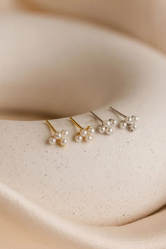 Discover our Coquette Charm collection. 💫🌿 Dainty Silver Cluster Earrings For Wedding, Silver Dainty Cluster Earrings For Wedding, Delicate Pearl White Bridal Earrings For Evening, Minimalist Pearl White Wedding Earrings, Minimalist Pearl White Bridal Earrings For Wedding, Minimalist Wedding Earrings For Pierced Ears, Dainty Pearl White Bridal Earrings For Wedding, Minimalist Single Earring For Wedding, Dainty Single Pearl Earring For Wedding