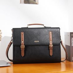 Flap closure 
   15.6 INCH LAPTOP BAG FOR WOMEN: A fresh take on a modern classic style, the briefcase for women is crafted in Vintage Vegan-leather. Perfectly poised and ready for the day, the CLUCI leather briefcase for women takes you anywhere you go in beautiful style.    LAPTOP BAG WITH MULTI-COMPARTMENT: Open magnetic snap flap closure and pull smooth metal zipper to reveal a roomy structured interior features 4 large compartments, 2 slip pockets,2 pen slots and 1 zip-fastening pocket – s Large Capacity Business Laptop Shoulder Bag, Large Capacity Shoulder Bag Briefcase For Business, Classic Large Capacity Laptop Bag For Office, Large Capacity Shoulder Briefcase For Business, Large Capacity Business Briefcase Shoulder Bag, Large Capacity Leather Briefcase For Work, Large Capacity Office Shoulder Bag Briefcase, Large Capacity Shoulder Briefcase For Office, Large Capacity Leather Laptop Bag For Work