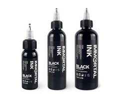 three black ink bottles with white caps