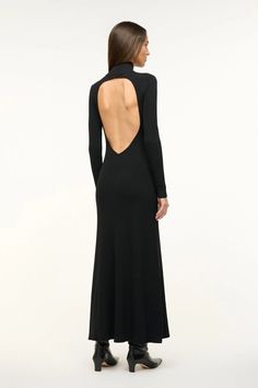 The Obsidian Dress from Staud is perfect for making an entrance. This stunning black maxi dress features a bold open back. The high neckline and long sleeves balance the daring back cutout, offering an unexpected twist to a classic silhouette. Fancy Date Night, Designer Hair Accessories, Cotton Poplin Dress, Dress With Long Sleeves, Poplin Dress, Black Maxi, Classic Silhouette, Event Dresses, High Neckline