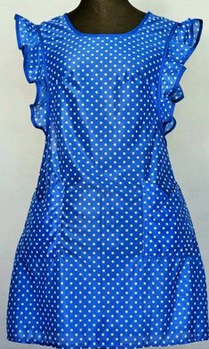 a blue dress with white polka dots on it