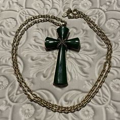 "Vintage Green Cross Necklace Juliet Faux Jade Pendant on Gold Tone 24\" chain. 1970's Avon. In good vintage condition. Please enlarge pictures to see details. Bright gold tone chain. 24\" chain comes off easily with C ring clasp so that it can be used with your other pendants.  Versatile chain and cross in good condition. See and enlarge photos for condition.  Vintage item shows some age and wear.  All items sold as is, as pictured.  US Domestic shipping only.  All sales final." Vintage Cross Pendant Jewelry With Adjustable Chain, Vintage Cross Chain Jewelry, C Ring, Bright Gold, Jade Pendant, Cross Necklace, Jewelry Necklace Pendant, Jade, 1970s