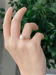 "14K 18K Gold Single Pearl Crystal Ring-Freshwater White Pearl-Zircon Crystal Single Pearl Ring- Wedding Anniversary Gift for Her- Thanksgiving Gift- Gifts for Her- New Year Gift for Her. MATERIAL SPECIFICATIONS Stock Code: Z098242 Metal : 14K 18K Solid Gold Color: Yellow gold, Rose gold, White gold Pearl Color : White THE WEIGHT OF OUR PRODUCTS MAY VARY + - 10% GR WHY OUR PEARL JEWELRY? The elegant and timeless pearl jewelry by BirinciJewelry is a musthave in every person's wardrobe. Natural pe Pearl Gold Necklace, Pearl Wedding Ring, White Pearl Ring, Beautiful Gold Necklaces, Single Pearl, Necklace Ring, Gold Pearl Necklace, Pearl Crystal, Wedding Anniversary Gift