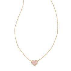 Dainty, sweet, and oh-so-chic, the Anna Pendant Necklace will have you feeling the love. An adorable heart pendant on a delicate chain, style this sweet necklace solo or stacked for a fun, flirty look. To preserve your fashion jewelry for years to come, agents such as soaps, perfumes, lotions, makeup, hair and cleaning products, and other chemical contact should be avoided. Take care to remove jewelry before showering, sleeping, exercising or swimming. Kendra Scott is known for its design and ma Chic Jewelry For Valentine's Day Gift, Chic Heart Pendant Jewelry For Valentine's Day, Trendy Necklaces For Valentine's Day Anniversary, Trendy Necklace For Anniversary On Valentine's Day, Trendy Anniversary Necklaces For Valentine's Day, Trendy Anniversary Necklace For Valentine's Day, Chic Valentine's Day Heart Pendant Jewelry, Chic Heart-shaped Charm Necklace As A Gift, Chic Heart-shaped Charm Necklace Gift