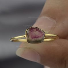 Watermelon Tourmaline Ring By Sushila Jewelry/ 14K Solid Gold Ring/ Bi Color Gemstone Ring/ Genuine Tourmaline Jewelry/ Birthday Gift Ideas NOTE: These Bío Tourmaline gemstones, sourced from natural mines, exhibit inherent variations in both color and shape. As each gemstone is unique, so we will provide you with a stone selection to choose from. ≫ Features * Items Code: SPBR00781M  * Metal: 14K Solid Gold (18K also available - Additional fees may apply) * More options in gold color: Rose gold, yellow gold, White gold * Watermelon Tourmaline Weight: 0.63 Ct  * Ring Size:- 2 to 10 ( All sizes as per your request ) ≫ FAQ below for more detail. ✦ Sizing  We can adjust most items to fit your sizing preferences. Most items can be made to any size and length. Please leave a note at checkout or c Watermelon Tourmaline Ring, Solid Gold Ring, Tourmaline Jewelry, Jewelry Birthday, Solid Gold Rings, Tourmaline Ring, Birthday Jewelry Gift, Watermelon Tourmaline, Tourmaline Gemstone