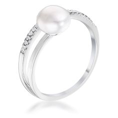 a white pearl and diamond ring