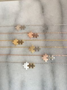 Puzzle Piece Necklace, Puzzle Jewelry, Rose Gold Chain, Puzzle Piece, Gold Piece, Puzzle Pieces, Gold And Silver, Gold Chain, Arrow Necklace