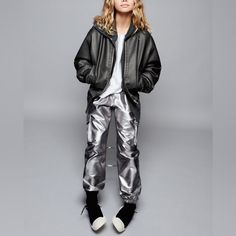 Genuine Zara New With Tag Material: Color: Silver Elastic Waistband Joggers Pants With Side Cargo Pockets. Cinch Leg Hem. Metallic Silver Pairs Well With Basic Top & Jacket Winter Streetwear Parachute Pants With Elastic Waistband, Winter Parachute Pants With Elastic Waistband For Streetwear, Winter Stretch Hip Hop Pants, Fall Streetwear Pants With Elastic Cuffs, Zara Sweatpants For Fall, Hip Hop Pants With Elastic Waistband For Fall, Zara Winter Pants, Trendy Zara Bottoms For Streetwear, Silver Cargo Pants