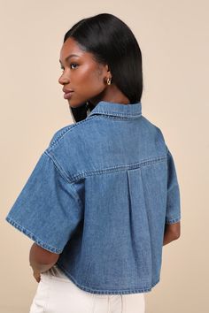 All-day comfort and compliments will be guaranteed when you step out in the Lulus Ensured Cuteness Medium Wash Denim Button-Up Collared Top! Lightweight cotton denim shapes this versatile top that exudes effortless chicness with its classic collared neckline and roomy short sleeves with subtle drop shoulders. The boxy, cropped bodice boasts a functional button placket along the center and a single patch pocket. Fit: This garment fits true to size. Length: Size medium measures 18.5" from shoulder Relaxed Fit Denim Top With Buttoned Pockets, Cotton Denim Jacket With Short Sleeves And Button Closure, Casual Collared Denim Jumpsuit With Button Closure, Casual Short Sleeve Denim Jumpsuit With Relaxed Fit, Casual Short Sleeve Relaxed Fit Denim Jumpsuit, Casual Denim Jumpsuit With Short Sleeves And Relaxed Fit, Casual Denim Jumpsuit With Short Sleeves, Relaxed Fit Denim Top With Snap Buttons, Relaxed Fit Cotton Denim Jumpsuit With Short Sleeves