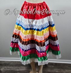 "Wide, gorgeous, silky skirt that is great for any religious ceremony. It is made of 9 silky colors with beautiful white lace. Washing Recommendations: Air dry, do not machine dry. Size: One size Waist- 24\"-42\" inches Length- 32\" inches Thanks for visiting my little shop and many blessings! :)" Multicolor Silk Flowy Skirt, Multicolor Flowy Silk Skirt, Multicolor Silk Skirt, Multicolor Long Skirt For Wedding, Bohemian Multicolor Skirt For Fiesta, Multicolor Bohemian Skirt For Fiesta, Fitted Multicolor Skirt With Attached Cancan, Bohemian Multicolor Silk Skirt, Multicolor Silk Bohemian Skirt