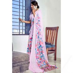 Pull together a chic look when you wear this pale pink poly silk saree which exudes feminine charm. This sweetheart neckline and half-sleeve blouse is elaborated using weaved sequins, thread, and printed work. It is completed with poly silk lightweight saree in pale pink color adorned with weaved sequins, thread, and printed work. This blouse can be customized up to the maximum size available in inches 44 around the bust. Pale Pink Color, Work It, Beautiful Blouses