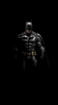 the dark knight in batman's costume is standing with his hands on his hips