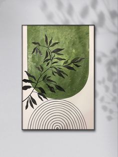 an abstract painting with green and black leaves in the center, on a white wall