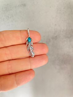 "Materials: Sterling Silver 925, turquoise Feather pendant with turquoise, Sterling Silver Feather Necklace, Feather Jewelry Silver feather Angel Feather Necklace Angel jewelry The pendant comes without chain. If you need a chain, you can purchase it separately by selecting the size. We have two kinds of chains: Snake chain 16 \"18\" 20 \" 24\" Chain in the form of rings 18 \" www.etsy.com/shop/HandmadeNordicGifts?section_id=32386755" Turquoise Feather Jewelry As A Gift, Turquoise Feather Jewelry As Gift, Necklace Feather, Silver Feather Necklace, Angel Feather, Angel Feathers, Angel Jewelry, Feather Necklace, Feather Jewelry