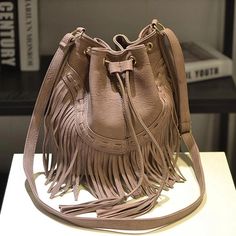 Blush Leather Vintage Fringe Bag Tassels Crossbody Bucket Bags | Baginning Chic Bucket Shoulder Bag With Tassels, Brown Fall Party Bags, Fall Party Brown Bags, Brown Party Bags For Fall, Elegant Brown Bags With Tassels, Elegant Brown Bag With Fringe, Elegant Brown Shoulder Bag With Tassels, Rectangular Bags With Tassels For Fall, Daily Use Bucket Shoulder Bag With Tassels