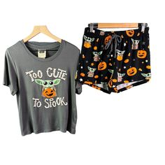 Get Ready For A Spooky Yet Adorable Night With This Star Wars 'Too Cute To Spook' Pajama Set Featuring Baby Yoda. This Cozy Set Includes A Short-Sleeve Top And Matching Shorts, Both Adorned With Charming Halloween-Themed Graphics. Made From A Soft Blend Of Polyester And Spandex, These Pajamas Offer Comfort And Stretch, Perfect For Lounging Or Sleeping. The Shorts Feature An Elastic Waistband With A Drawstring For A Customizable Fit. Ideal For Any Star Wars Fan Or Those Looking To Add A Playful T Yoda Halloween, Shorts Sleepwear, Halloween Pajamas, Star Wars Women, Star Wars Baby, Matching Shorts, Women's Intimates, Pajama Set, Short Sleeves Tops