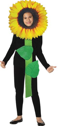 a child wearing a sunflower costume standing in front of a white background