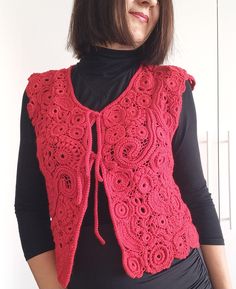 Crochet gilet for women.Irish crochet vest.Women's vest crocheting. Crochet vest sweater.Lace vest crocheting.Red vest women's crochet. This women's vest is crocheting from thick semi-wool yarn. This is a warm women's vest. This vest will delight you with its warmth on cool days. Women's crocheted vest is suitable as a gift for Christmas. Size: L chest-96cm/37.7' inches waist-88cm/34.6'inches length-50cm/19.6'inches Material: 51%acrylic,49%wool Color: red,burgundy red Care: Handwash,30* Can be i Crochet Vest Sweater, Velvet Crochet Vest, Fitted Bohemian Crochet Vest Top, Crochet. Women Vest, Crochet Fae Vest, Crochet Gilet, Fitted Bohemian Crochet Vest, Crocheted Vest, Sweater Lace