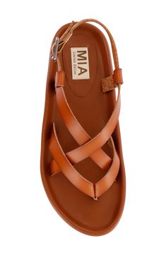 Smooth and slender straps weave into one another on this paradise-ready sandal set atop a cushioned footbed. 1" platform Adjustable ankle strap with buckle closure Cushioned footbed Synthetic upper, lining and sole Imported Adjustable Ankle Strap Sandals With Braided Straps, Brown Leather Sandals With Braided Straps, Brown Adjustable Footbed Sandals, Adjustable Brown Footbed Sandals, Synthetic Sandals With Braided Ankle Straps, Brown Slingback Sandals With Adjustable Straps For Vacation, Brown Adjustable Straps Footbed Sandals For The Beach, Brown Strappy Slingback Sandals With Adjustable Strap, Brown Vacation Sandals With Adjustable Straps