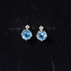 Product Details Add charm to your outfit with these Solitaire Earrings embellished with Round Cut Swiss Blue Topaz Solitaire and Round Brilliant Moissanite in prong setting. Crafted in Gold, the Women Stud Earrings come with Screw Back Closure to keep the Swiss Blue Topaz Earrings secure. These December Birthstone Earrings are perfect for casual or special occasions. Surprise your beloved with these Earrings as an Anniversary Gift and make their day memorable. Product Information SKU SHP-EARRING Women Stud Earrings, Solitaire Earrings, Birthstone Earrings, Blue Topaz Earrings, Solitaire Studs, Topaz Earrings, Birthstone Earring, Swiss Blue Topaz, December Birthstone