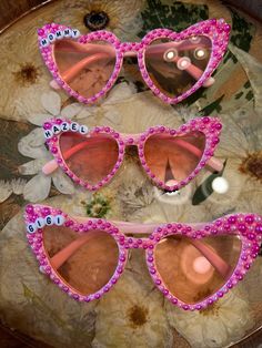 Bedazzled custom sunglasses great for a bachelorette, concert, vacation or just any day  Available for kids and adults Personalized Pink Sunglasses For Party, Fun Customizable Sunglasses For Party, Customizable Fun Sunglasses For Parties, Trendy Personalized Party Sunglasses, Fun Personalized Sunglasses For Party, Personalized Pink Sunglasses As A Gift, Pink Personalized Sunglasses For Gift, Customizable Pink Sunglasses For The Beach, Pink Sunglasses With Custom Name And Adjustable Fit