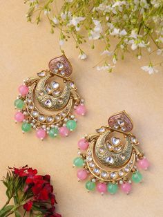 Unleash your inner diva with our mesmerizing Indian Kundan and polki Earrings. Designed to make a bold statement, these earrings exude captivating splendor, blending traditional Indian aesthetics with contemporary allure. Crafted with meticulous attention to detail, these earrings showcase the artistry of Kundan work. The vibrant Kundan stones take center stage, radiating a luminous charm that catches every eye. The intricate setting in gleaming golden tones adds an element of opulence and elevates their allure to new heights. Each earring weighs 22 gms  Length 3 inches  Width 1.5 inches Punjabi Jewelry, Kundan Work, Jewelry Pakistani, Polki Earrings, Chandbali Earrings, Wedding Jewellery, Pakistani Wedding, Traditional Indian, Center Stage