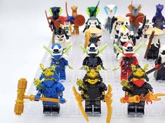 a group of legos that are all dressed up in different colors and sizes,