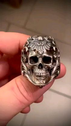 This is the heavy metal rock star of our skull rings. The hyper realistic skull is individually cast in 925 silver and embedded in an intricate floral ornament silver ring band to give the ring a contrasting dual-tone of silver. This eye-catcher skull ring is an absolute conversation-starter piece of work. Floral Armor, Realistic Skull, Silver Ring Band, Skull Rings, Exotic Jewelry, Heavy Metal Rock, Tarnish Remover, Floral Ornament, Animal Bones