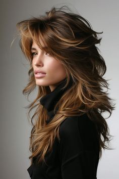 This long-layered shaggy mullet hairstyle for women is enhanced with caramel brown highlights. The warm highlights add dimension to the cut, creating a dynamic and vibrant look that’s perfect for adding a touch of brightness to your style. Layered Shag, Shaggy Long Hair, Long Shag Haircut, Arabian Stallions, Shag Haircuts, Hairstyles For Layered Hair, Everyday Clothing, New Hairstyle