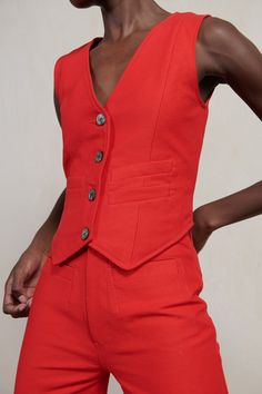 A fully lined menswear inspired vest, punctuated with feminine tailoring. A v-neckline and front welt pockets. Cotton twill tape ties up the back. Seashell buttons up the front. Woman Vest, Professional Outfits Women, Black Tank Dress, Black Aviators, Outerwear Vest, Boyfriend Tee, Menswear Inspired, Hats For Sale, Professional Outfits