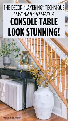 a white vase sitting on top of a wooden floor next to a stair banister