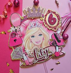 a pink and gold birthday card with barbie on it