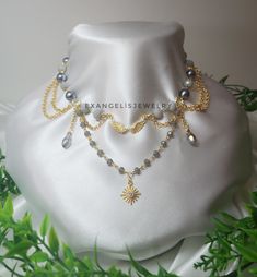 "Gray Beaded Fairycore Necklace is crafted with glass pearl beads, acrylic crystal beads and gold plated  brass chains and accents. It is 14\" and has an extansion chain. If you want to change the length,I can customize this product for you.  Please do not wear the necklace while sleeping, showering or doing sports. I advise you to try to keep it away from water, chemicals and perfumes. If you have any request please do not hesitate to ask. Thanks for stop by For more visit my shop: ExangelsJewelry.etsy.com" Gold Beaded Metal Pearl Necklace, Gold Crystal Necklace With Pearl Chain, Fairycore Beaded Pearl Jewelry, Fairycore Pearl Beaded Jewelry, Fairycore Gold Dangle Jewelry, Gold Crystal Dangle Necklaces With Beaded Chain, Handmade Gold Crystal Metal Necklace, Festival Gold Pearl Chain Necklace, Festival Gold Necklace With Pearl Chain