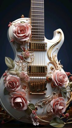 a white guitar with pink roses on it