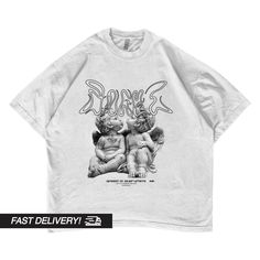 oversized heavyweight y2k shirt. Fast shipping by USPS. SHAKAWEAR box-fit-styled t-shirt originated in the early fashion era of the 90s. Popularized by streetwear, it is an iconic shirt that delivers fashion and style. A classic throwback is made for all generations.   Features FEATURES - Heavy knit - Retro look - 100% Cotton - Oversize fit - 7.5 oz. Fabric Weight - High quality print. Care Instructions - Wash in warm water, max 40C or 105F. - Use non-chlorine bleach only when necessary. - Do not dry clean. - Do not iron. - Tumbe Dry Medium. Every shirt is printed and shipped with care. SHIPPING Shipping worldwide using USPS. Please see at the rate at the checkout. Orders are processed within 1-7 working days after the payment is received. DELIVERY TIMES USA 5-7 working days (depends on yo Oversized Y2k T-shirt With Screen Print, Oversized Y2k T-shirt With Text Print, Oversized Y2k T-shirt With Letter Print, Oversized Y2k T-shirt With Short Sleeves, Oversized Grunge T-shirt For Streetwear, Y2k Style Text Print T-shirt For Streetwear, Y2k Style Relaxed Fit T-shirt For Streetwear, Punk T Shirt, Streetwear T Shirt