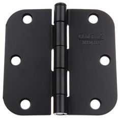 an image of a black door hinge with two holes on the front and side