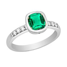 METAL SPECIFICATIONS Two Tone Gold 14K STONE SPECIFICATIONS Stone Name : Green Emerald and Diamond Stone Cut : Cushion and Round Cut Stone Details : There is one cushion cut green emerald stone in the center approx. 2.50 carats (Approx. Size 7 x 7 mm) with approx. 0.50 carats of small round diamonds on the sides. Crafted with natural earth mined stones. Color : Green/F Clarity : VS1 Quality : AAA Total : Approx. 3 Carats RING SPECIFICATIONS Appraised Value : $8,478.00 Size : 6.5 (Can ship in any size) Comes with Certificate Classic Green Diamond Ring With Bezel Setting, Cushion Cut Emerald Green Rings, Cushion Cut Emerald Ring For Formal Occasions, Green Cushion Cut Diamond Ring With Center Stone, Asscher Cut Emerald Ring With Diamond Accents, Green Diamond May Birthstone Rings, Green Rings With Diamond Accents, Classic Green Emerald Ring With Accent Stones, Fine Jewelry Green Diamond Ring With Gemstone Accents