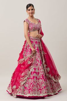 Hot pink attached cancan lehenga with all over mughal mahal zardozi embroidery adorned with sequin highlights and tassel ornamentation. Paired with a short cap sleeves padded blouse with zardozi-sequin bloom embroidery and a floral zardozi embroidered border organza dupatta. - Aza Fashions Festive Ceremony Lehenga With Pallu, Diwali Ceremony Choli With Zari Work, Anarkali Choli With Pallu For Ceremony, Choli With Pallu For Diwali Ceremony, Floor-length Lehenga With Dori Work For Ceremonies, Semi-stitched Ceremony Choli With Dori Work, Diwali Choli With Pallu For Ceremony, Festival Choli With Dori Work For Ceremonies, Diwali Ceremony Choli With Pallu Detail