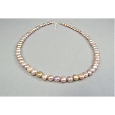 A lustrous and colorful real pink freshwater pearl bead necklace created with natural irregular-shaped baroque pearls and your favorite metal choice, 925 sterling silver or 14K gold fill. The necklace has a spring ring clasp and 2-inch attached adjustable chain so every woman can get just the right fit. The 7-8mm pearl nuggets range in color from pale pink to golden peach and blush lavender to dark mauve.  A lovely style for everyday casual and elegant dressy occasions. Free USPS first class dom Pink Pearl Necklace With High Luster, High Luster Pink Pearl Necklace, Pink Single Strand Baroque Pearl Necklace, Pink Pearl Necklace With Round Beads And Pendant, Pink Baroque Pearl Single Strand Necklace, Pink Baroque Pearl Necklace With Pearl Charm, Pink Polished Bead Pearl Necklace For Gifts, Pink Pearl Necklace With Polished Beads, Pink Polished Beads Pearl Necklace For Gifts