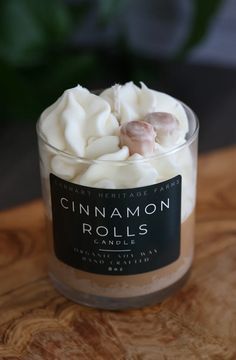 cinnamon rolls in a glass jar on a wooden table