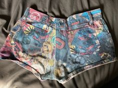 Excellent condition, purchased as vintage 1990s and worn twice.  100% cotton. Made in England. 29 inch waist. Please do get in touch in you have questions! Y2k High Waist Cotton Shorts, Y2k Cotton Short Bottoms, Y2k Cotton Bottoms Short Length, Y2k Cotton Shorts, 90s Cotton Shorts For Streetwear, 90s Style Cotton Shorts For Streetwear, 90s Style Relaxed Fit Cotton Shorts, Retro Graphic Print Bottoms For Streetwear, 90s High-waist Cotton Jean Shorts