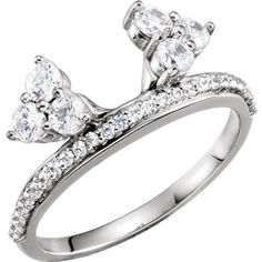 a white gold ring with three pear shaped diamonds