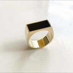 14k Black Onyx Ring, Ring for Men,Gold Ring, Black Ring, Solid Gold Ring, Modern Ring, Thick Ring, Flat Top Features * Made to Order. * Gold Kt: 14K  * Custom Gold Color: Rose Gold,White Gold, Yellow Gold * Size: Thickness if band is 10.5mm. Width at top is 22mm * Ready to Ship in 14 Business Days .  This jewelry is: ✪ Anti-Fading ✪ Nickel Free ✪ Non-Irritating metal ✪ Metal Allergy Free / Hypoallergenic ✪ Tarnish Resistant ✪ One Year Warranty How we wrap your jewelry We wrap your jewelry in a c Modern Black Enamel Signet Ring For Anniversary, Modern Onyx Signet Ring For Anniversary, Modern Yellow Gold Signet Ring With Black Enamel, Modern Black Signet Ring With Polished Edges, Modern Yellow Gold Onyx Signet Ring, Modern Black Enamel Ring For Anniversary, Black 14k Gold Open Signet Ring, Modern Black Enamel Open Ring, Modern Black 14k Gold Rings