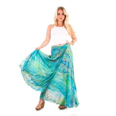 Be unique | Wear art A beautiful and floaty wrap skirt, perfect for both days and nights, with high heels, flat sandals or trainers. Made of 100% rayon - a bio-based soft and breathable fabric. Limited edition. One size, just wrap the skirt around your waist. Can fit a size 6 to 16 UK size, 38/48 EU size, 2/12 US size, 6/16 Australian size, 38/48 Italian size. Comes in five different prints. Designed in London - made with love. Breezy Tiered Maxi Skirt, Breezy Tiered Flowy Maxi Skirt, Breezy Tiered Lined Maxi Skirt, Breezy Tiered Maxi Skirt With Lining, Breezy Maxi Summer Bottoms, Breezy Maxi Length Summer Bottoms, Breezy Maxi Length Bottoms For Summer, Flowy Asymmetrical Skirt For Summer, Flowy Long Breezy Maxi Skirt