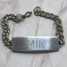 See pics for scale and condition. Vintage Identification ID Bracelet Engraved "MIK" SB8 Vintage Silver Wristband As Gift, Vintage Silver Wristband For Gift, Vintage Silver Bracelets Hand Stamped, Vintage Silver Nameplate Jewelry, Vintage Metal Engraved Bracelets, Antique Engraved Chain Bracelet Gift, Vintage Metal Chain Bracelet Engraved, Pictures From The 80s, Bracelet Picture