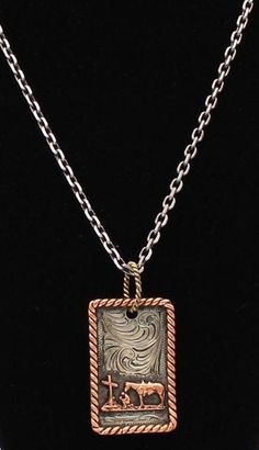 Silver Strike Men's Necklace with Praying Cowboy Details Silver Strike Men's Necklace Dog Style Tag Praying Cowboy and Floral Scrolling Rope Edge 24" Silver Tone Chain Sterling Silver Plated Description Men’s Silver Strike necklace. Beautiful antique silver dog tag style pendant with praying cowboy and floral scrolling. Rope edge in antique copper. Sterling Silver plated. 24 inch chain. Cowboy Jewelry, Rodeo Jewelry, Western Rings, Western Bracelets, Cowgirl Bling, Western Purses, Western Accessories, Silver Dog, Western Belt Buckles